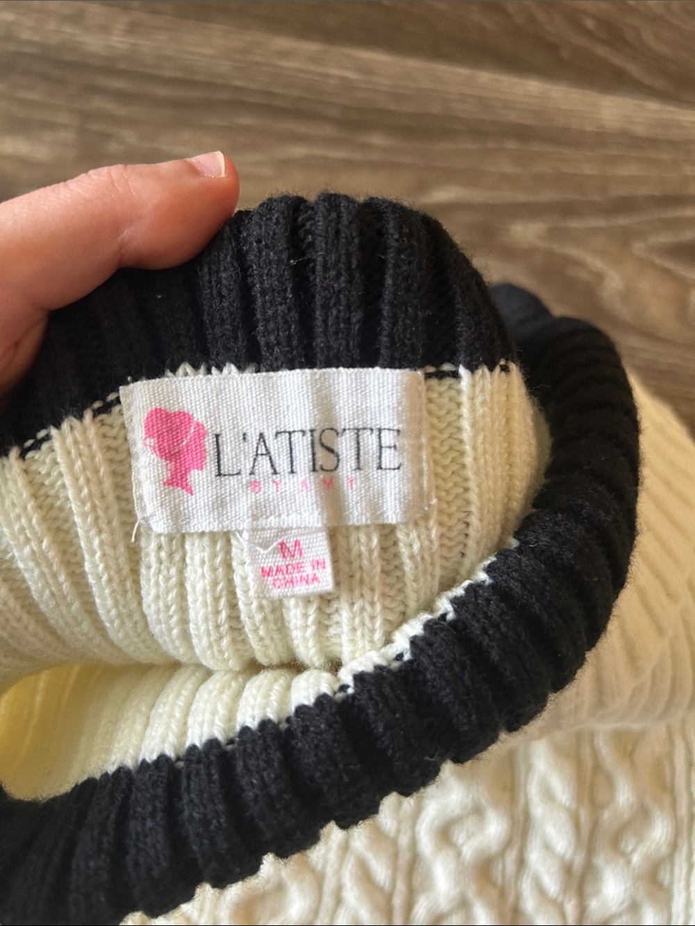 L'ATISTE Cream Off-the-Shoulder Cable Knit Sweater with Black Trim - Picture 2 of 4